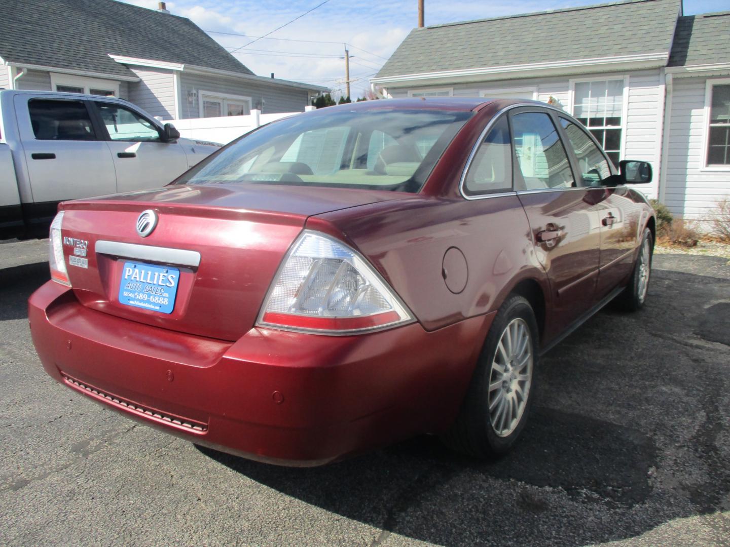 2005 RED Mercury Montego (1MEFM421X5G) with an 3.0L L4 DOHC 16V engine, AUTOMATIC transmission, located at 540a Delsea Drive, Sewell, NJ, 08080, (856) 589-6888, 39.752560, -75.111206 - Photo#5